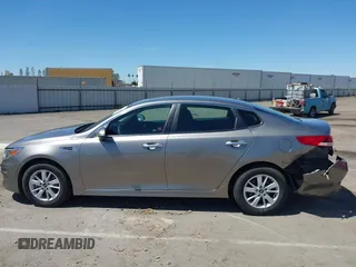 2016 Kia Optima LX with VIN 5XXGT4L36GG098804, listed as a IAAI auction lot 42772231 with 206,471 mi miles and . Bid and sale history available at DreamBid. Image 15.