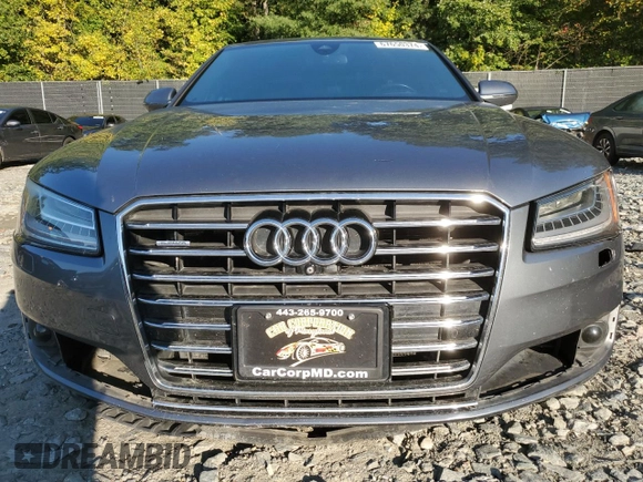2015 Audi A8 with VIN WAUJGAFD3FN013026, listed as a Copart auction lot 67650374 with 88,064 mi miles and Salvage title. Bid and sale history available at DreamBid. Image 5.