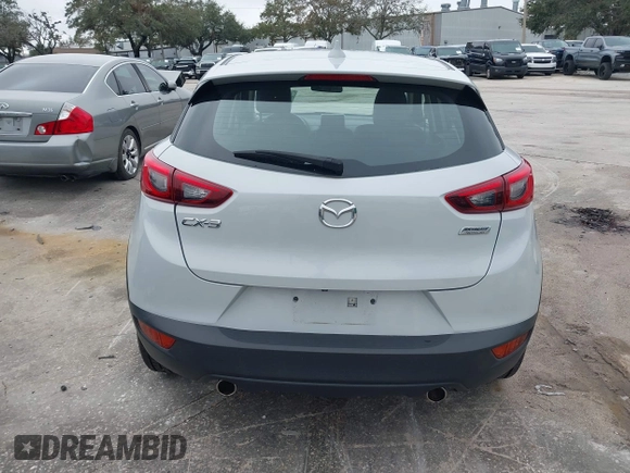 2016 Mazda CX-3 Grand Touring with VIN JM1DKDD72G0128891, listed as a IAAI auction lot 41401456 with 60,911 mi miles. Bid and sale history available at carsss.com. Image 16.