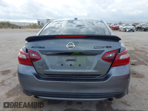 2018 Nissan Altima 2.5 S with VIN 1N4AL3AP9JC288485, listed as a IAAI auction lot 40718406 with 106,819 mi miles. Bid and sale history available at carsss.com. Image 16.