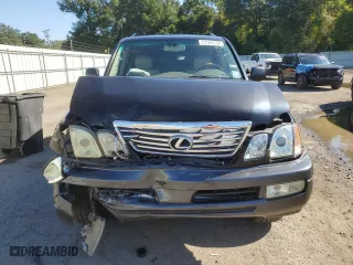 2006 Lexus LX 470 with VIN JTJHT00W664006446, listed as a Copart auction lot 73165774 with 294,950 mi miles and Salvage Title. Bid and sale history available at carsss.com. Image 5.