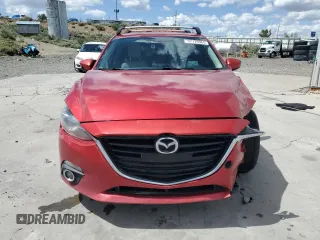 2014 Mazda 3 S Grand Touring z VIN JM1BM1M37E1187794, wystawiony jako Copart lot #57176965 z przebiegiem 183 166 mil mil oraz Szkoda całkowita • Salvage title. Historia ofert i sprzedaży dostępna na DreamBid. Obrazek 5.