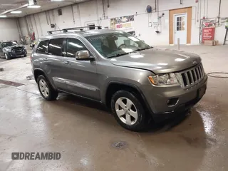 2011 Jeep Grand Cherokee Laredo with VIN 1J4RR4GG7BC578079, listed as a IAAI auction lot 42491750 with 197,581 mi miles and . Bid and sale history available at DreamBid. Image 1.