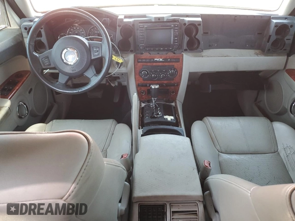 2006 Jeep Commander Limited z VIN 1J8HG582X6C171002, wystawiony jako Copart lot #62952795 z przebiegiem 221 626 mil mil oraz Szkoda całkowita • Salvage title. Historia ofert i sprzedaży dostępna na DreamBid. Obrazek 8.