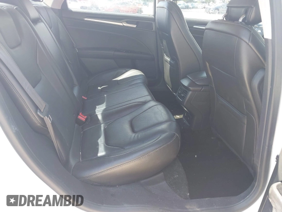 2013 Ford Fusion Titanium with VIN 3FA6P0SU0DR239890, listed as a IAAI auction lot 42745530 with 129,458 mi miles and . Bid and sale history available at DreamBid. Image 8.