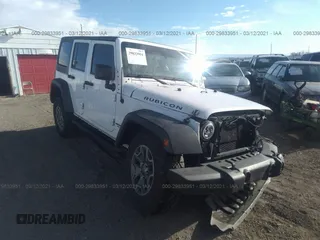 2013 Jeep Wrangler Unlimited Rubicon 10th Anniversary with VIN 1C4HJWFG0DL681417, listed as a IAAI auction lot 29833951 with 118,673 mi miles and . Bid and sale history available at DreamBid. Image 1.