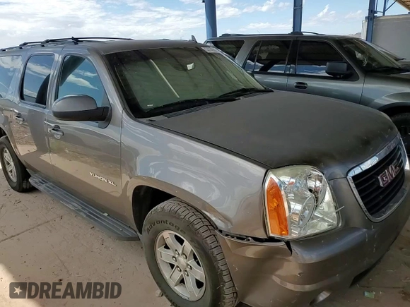 2013 GMC Yukon XL SLT with VIN 1GKS1KE09DR305240, listed as a Copart auction lot 53143565 with 210,872 mi miles and Salvage Title. Bid and sale history available at DreamBid. Image 12.