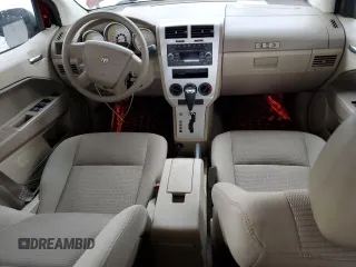 2009 Dodge Caliber SXT z VIN 1B3HB48A29D156808, wystawiony jako Copart lot #52732095 z przebiegiem 99 613 mil mil oraz Szkoda całkowita • Salvage title. Historia ofert i sprzedaży dostępna na DreamBid. Obrazek 8.