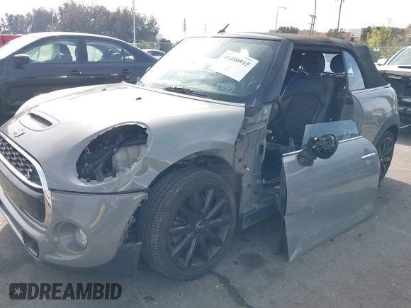2017 MINI Convertible Cooper S z VIN WMWWG9C36H3C81439, wystawiony jako IAAI lot #41480915 z przebiegiem 64 104 mil mil oraz . Historia ofert i sprzedaży dostępna na DreamBid. Obrazek 6.