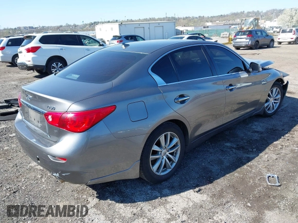 2015 Infiniti Q50 Premium with VIN JN1BV7AR2FM392399, listed as a IAAI auction lot 41978343 with 108,679 mi miles and . Bid and sale history available at DreamBid. Image 4.