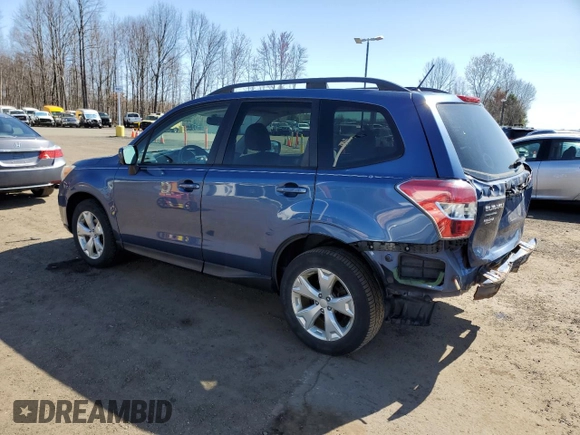 2014 Subaru Forester 2.5i Premium with VIN JF2SJAEC5EH517478, listed as a Copart auction lot 52067715 with 100,707 mi miles and Salvage Title. Bid and sale history available at carsss.com. Image 2.