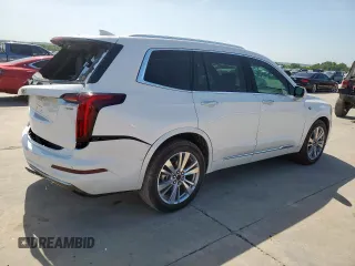 2024 Cadillac XT6 FWD Premium Luxury with VIN 1GYKPCRS7RZ711983, listed as a Copart auction lot 64842625 with 6,394 mi miles and Clean title. Bid and sale history available at DreamBid. Image 3.