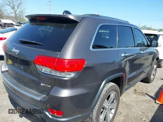 2016 Jeep Grand Cherokee Limited 75th Anniversary with VIN 1C4RJFBG0GC359648, listed as a IAAI auction lot 41984015 with 126,159 mi miles and . Bid and sale history available at DreamBid. Image 4.