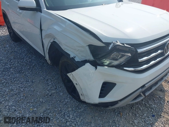 2023 Volkswagen Atlas SE z VIN 1V2WR2CA6PC547040, wystawiony jako IAAI lot #42400535 z przebiegiem 25 300 mil mil oraz . Historia ofert i sprzedaży dostępna na DreamBid. Obrazek 6.