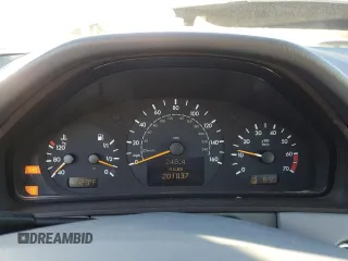 2000 Mercedes-Benz E-Class AWD with VIN WDBJF82G1YX028712, listed as a Copart auction lot 43983315 with 201,037 mi miles and Salvage Title. Bid and sale history available at carsss.com. Image 9.