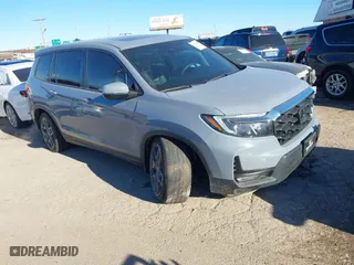 2022 Honda Passport EX-L with VIN 5FNYF7H57NB005716, listed as a IAAI auction lot 41078499 with 33,141 mi miles. Bid and sale history available at carsss.com. Image 1.