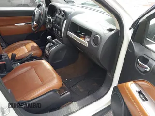 2014 Jeep Compass Limited with VIN 1C4NJDCB6ED684897, listed as a IAAI auction lot 41920568 with 175,196 mi miles. Bid and sale history available at carsss.com. Image 5.
