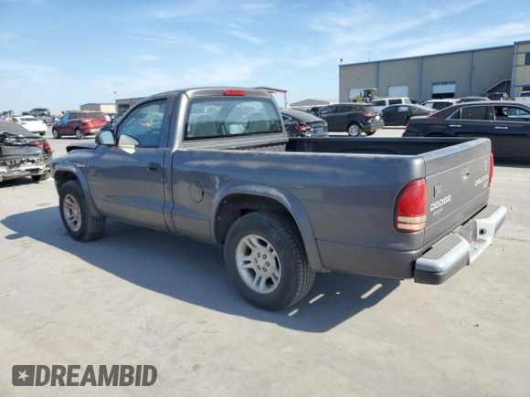 2003 Dodge Dakota with VIN 1D7FL16X13S189963, listed as a Copart auction lot 77114344 with 100,127 mi miles and Salvage Title. Bid and sale history available at carsss.com. Image 2.