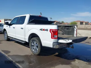 2015 Ford F-150 XLT with VIN 1FTEW1EP0FKE42273, listed as a IAAI auction lot 41988265 with 119,483 mi miles. Bid and sale history available at carsss.com. Image 3.