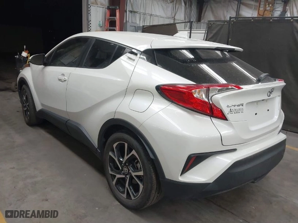 2021 Toyota C-HR LE with VIN JTNKHMBXXM1110696, listed as a IAAI auction lot 41442570 with 44,967 mi miles. Bid and sale history available at carsss.com. Image 3.