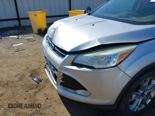 2013 Ford Escape SEL with VIN 1FMCU0H96DUA30733, listed as a IAAI auction lot 42737439 with 106,651 mi miles and . Bid and sale history available at DreamBid. Image 6.