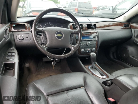 2014 Chevrolet Impala LTZ z VIN 2G1WC5E31E1184046, wystawiony jako Copart lot #62561395 z przebiegiem 207 989 mil mil oraz Czysty tytuł • Clean title. Historia ofert i sprzedaży dostępna na DreamBid. Obrazek 8.
