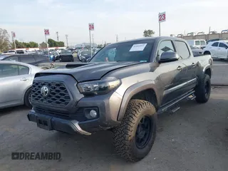 2021 Toyota Tacoma 4WD SR5 with VIN 3TMDZ5BN2MM108586, listed as a IAAI auction lot 41604953 with 65,422 mi miles. Bid and sale history available at carsss.com. Image 17.