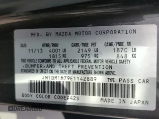 2014 Mazda 3 i Grand Touring with VIN JM1BM1M79E1142889, listed as a Copart auction lot 53263345 with 146,606 mi miles and Salvage Title. Bid and sale history available at DreamBid. Image 12.