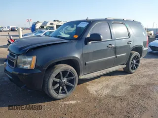 2007 Chevrolet Tahoe LS with VIN 1GNFC13CX7R406202, listed as a IAAI auction lot 41951878 with 181,571 mi miles and . Bid and sale history available at DreamBid. Image 2.