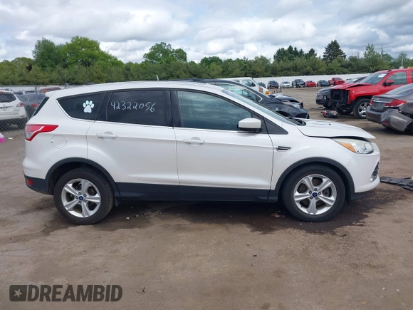 2016 Ford Escape SE z VIN 1FMCU9GX3GUB85250, wystawiony jako IAAI lot #42322056 z przebiegiem 187 833 mil mil oraz . Historia ofert i sprzedaży dostępna na DreamBid. Obrazek 13.