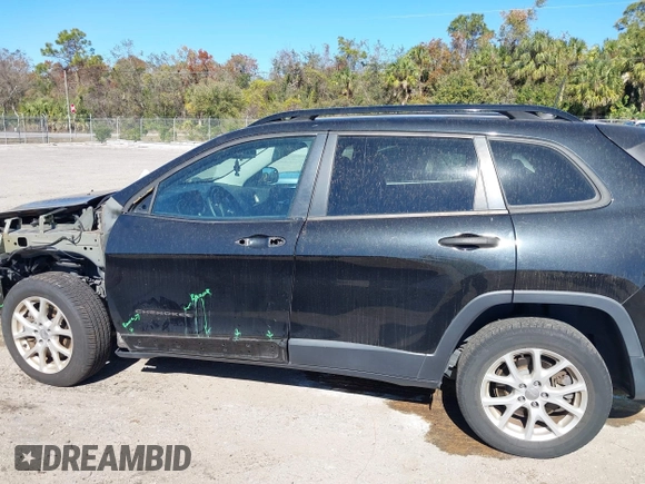 2016 Jeep Cherokee Sport with VIN 1C4PJLAS5GW376259, listed as a IAAI auction lot 41287458 with 92,075 mi miles and . Bid and sale history available at DreamBid. Image 14.
