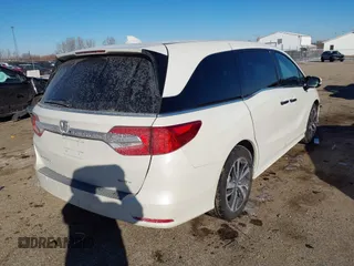 2018 Honda Odyssey Elite with VIN 5FNRL6H97JB039191, listed as a IAAI auction lot 41625687 with 54,363 mi miles and . Bid and sale history available at DreamBid. Image 4.
