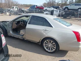 2015 Cadillac CTS Performance AWD with VIN 1G6AY5S35F0110281, listed as a IAAI auction lot 41670400 with 103,121 mi miles and . Bid and sale history available at DreamBid. Image 15.