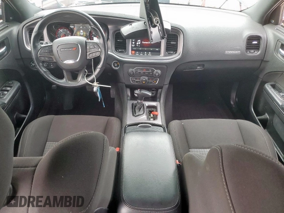 2021 Dodge Charger R/T with VIN 2C3CDXCT6MH504218, listed as a Copart auction lot 60407915 with 67,596 mi miles and Salvage title. Bid and sale history available at DreamBid. Image 8.