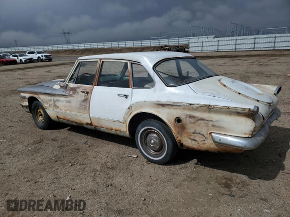 1960 Plymouth Valiant z VIN 1307117456, wystawiony jako Copart lot #48976045 z przebiegiem 20 241 mil mil oraz Czysty tytuł • Clean title. Historia ofert i sprzedaży dostępna na DreamBid. Obrazek 2.