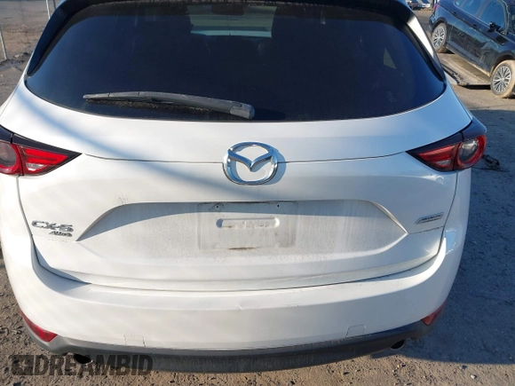 2018 Mazda CX-5 S Premium with VIN JM3KFBDM8J1419006, listed as a IAAI auction lot 41498658 with 123,622 mi miles and . Bid and sale history available at DreamBid. Image 17.