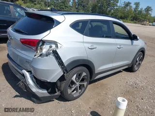 2018 Hyundai Tucson Value with VIN KM8J3CA26JU697712, listed as a IAAI auction lot 40323457 with 53,175 mi miles. Bid and sale history available at carsss.com. Image 4.
