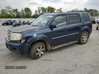 2011 Honda Pilot Touring z VIN 5FNYF4H93BB068387, wystawiony jako Copart lot #52959175 z przebiegiem 273 560 mil mil oraz Szkoda całkowita • Salvage title. Historia ofert i sprzedaży dostępna na DreamBid. Obrazek 1.