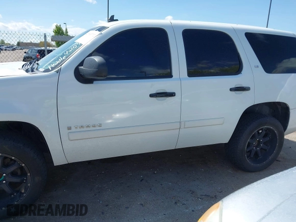 2007 Chevrolet Tahoe LS with VIN 1GNFC13C77J404051, listed as a IAAI auction lot 42093772 with 213,729 mi miles and . Bid and sale history available at DreamBid. Image 6.