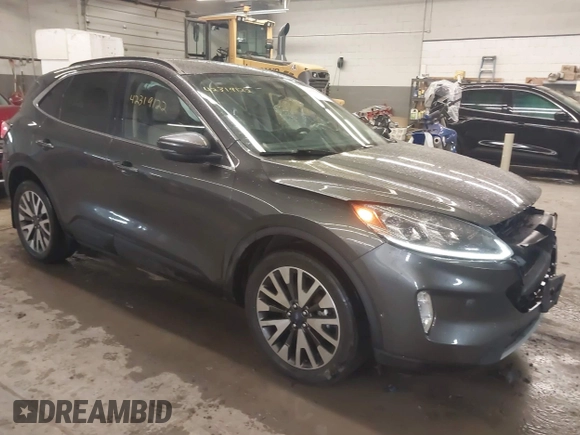 2020 Ford Escape Titanium with VIN 1FMCU9J95LUA39338, listed as a IAAI auction lot 42319122 with 34,631 mi miles and . Bid and sale history available at DreamBid. Image 1.