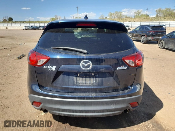 2016 Mazda CX-5 Touring z VIN JM3KE4CY8G0758947, wystawiony jako Copart lot #53140005 z przebiegiem 47 172 mil mil oraz Szkoda całkowita • Salvage title. Historia ofert i sprzedaży dostępna na DreamBid. Obrazek 6.