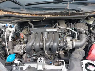 2015 Honda Fit EX-L with VIN 3HGGK5H81FM771171, listed as a IAAI auction lot 42129011 with 132,255 mi miles and . Bid and sale history available at DreamBid. Image 10.