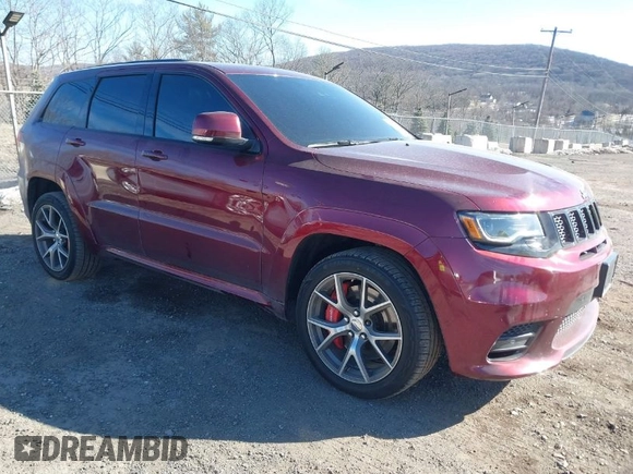 2017 Jeep Grand Cherokee SRT with VIN 1C4RJFDJ1HC754559, listed as a IAAI auction lot 41461029 with 100,096 mi miles. Bid and sale history available at carsss.com. Image 1.