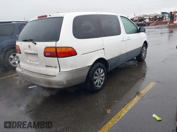 1999 Toyota Sienna CE with VIN 4T3ZF19C0XU169353, listed as a IAAI auction lot 41534196 with 189,783 mi miles. Bid and sale history available at carsss.com. Image 4.