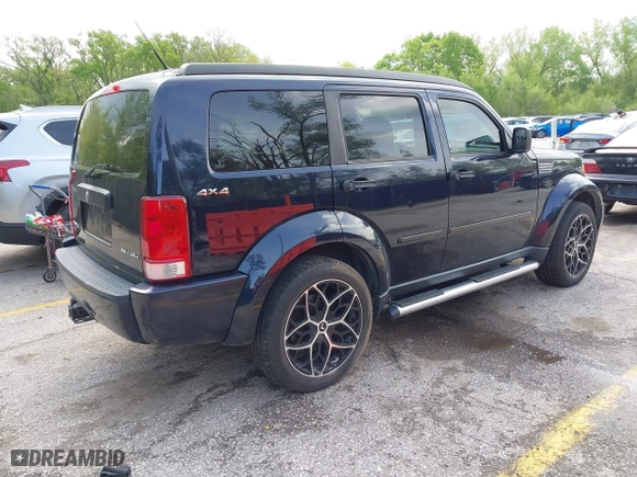 2011 Dodge Nitro Heat with VIN 1D4PU4GX2BW514237, listed as a IAAI auction lot 42109697 with 151,365 mi miles. Bid and sale history available at carsss.com. Image 4.