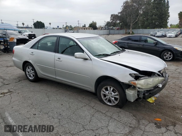 2005 Toyota Camry LE with VIN 4T1BF32KX5U601192, listed as a Copart auction lot 55365485 with 153,251 mi miles and Salvage Title. Bid and sale history available at DreamBid. Image 4.