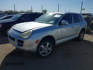 2005 Porsche Cayenne S with VIN WP1AB29P75LA62851, listed as a IAAI auction lot 41685787 with 143,711 mi miles. Bid and sale history available at carsss.com. Image 2.