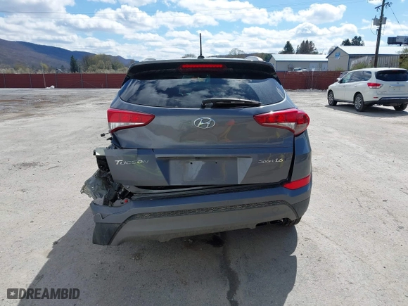 2016 Hyundai Tucson Sport with VIN KM8J33A2XGU022633, listed as a IAAI auction lot 41990348 with 73,395 mi miles. Bid and sale history available at carsss.com. Image 17.