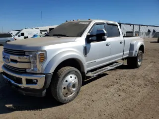 2019 Ford F-450 XL with VIN 1FT8W4DTXKEG74353, listed as a Copart auction lot 71077974 with 138,672 mi miles and Salvage Title. Bid and sale history available at carsss.com. Image 1.