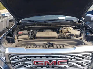 2020 GMC Sierra 1500 Denali with VIN 1GTU9FEL3LZ195864, listed as a IAAI auction lot 40593921 with 74,982 mi miles and . Bid and sale history available at DreamBid. Image 10.